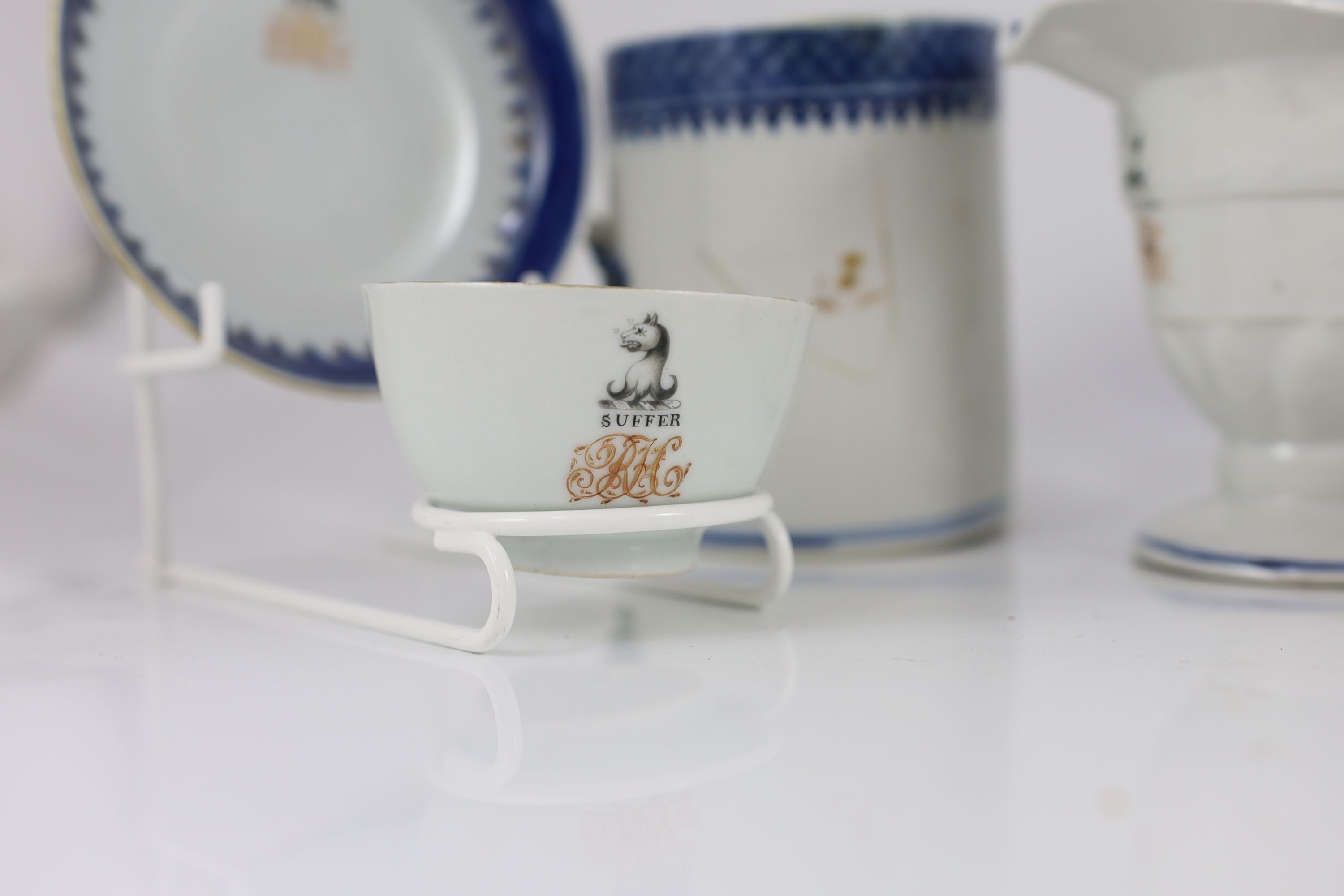 A Chinese export armorial forty two piece part tea service, late 18th century, decorated with the Haldane crest and motto 'Suffer'